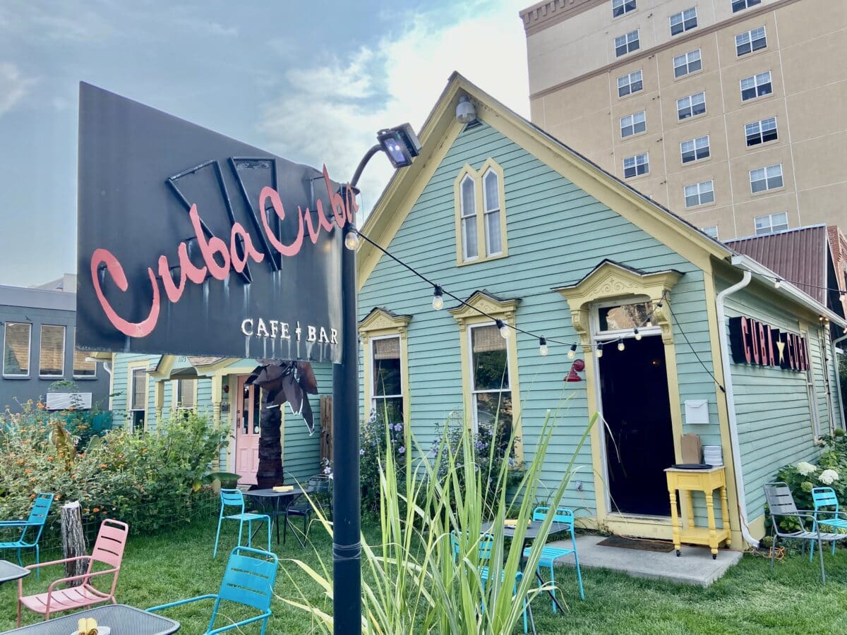 photo of restaurant named Cuba Cuba with sign in front for dining option for weekend in Denver