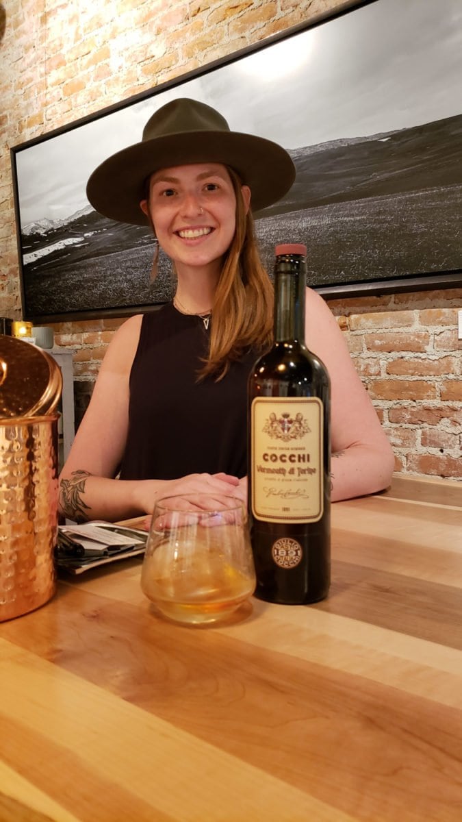 Gretchen pouring vermouth